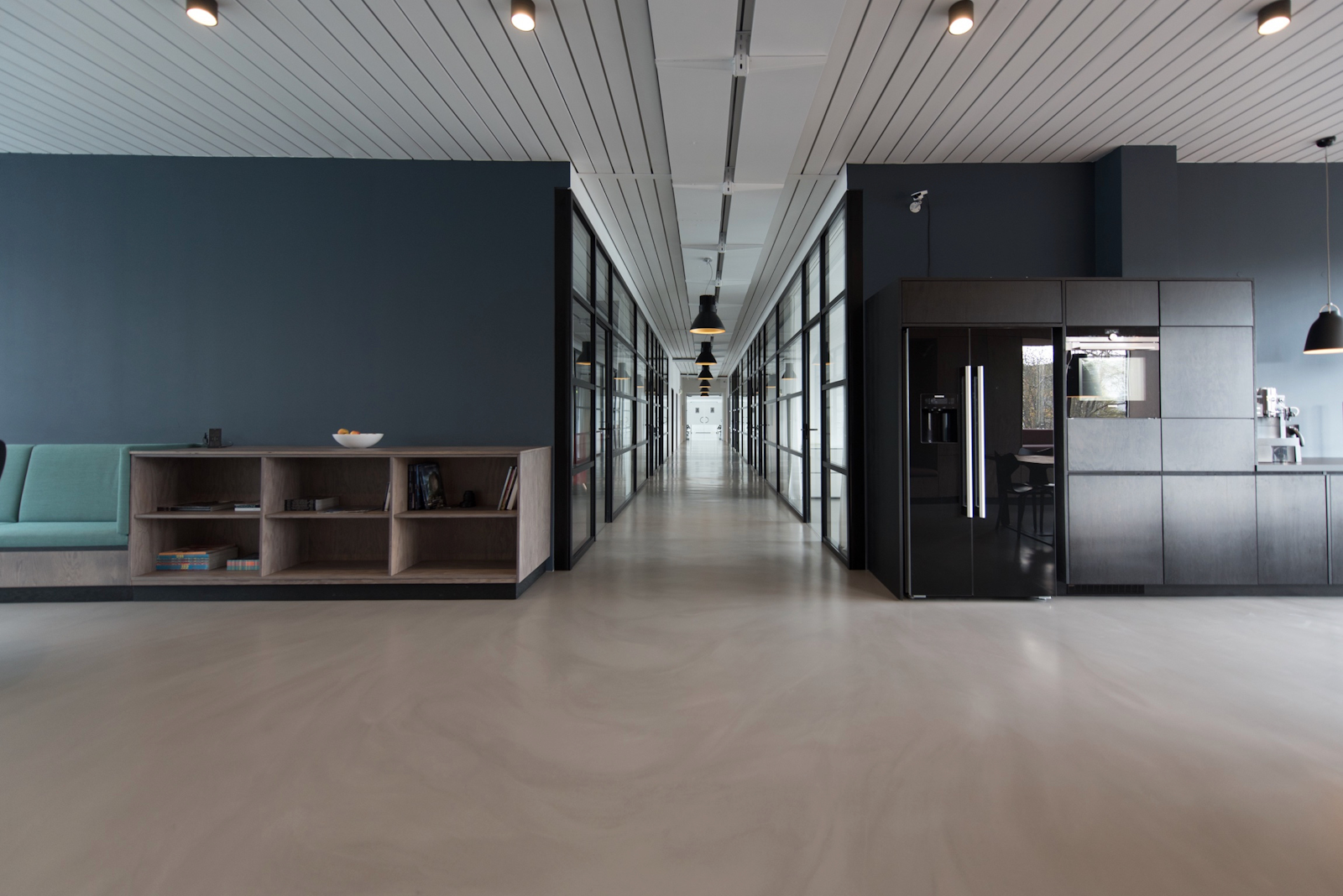 Open office with windows and collaborative tables